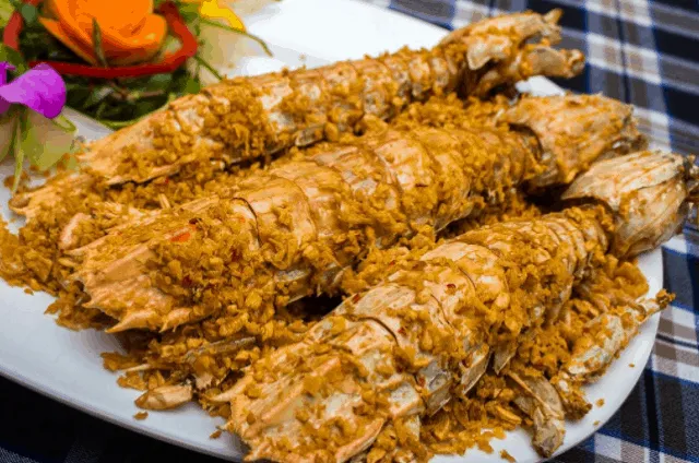 Fried Mantis Shrimp with Garlic, a Can Gio specialty attracting tourists