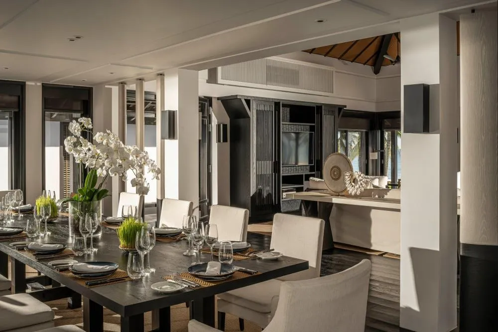 overview of Four Seasons Resort The Nam Hai featuring architecture with strong Vietnamese cultural influences on Ha My Beach