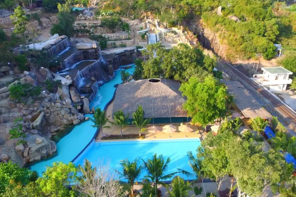 Overview of the resort surrounded by lush green trees