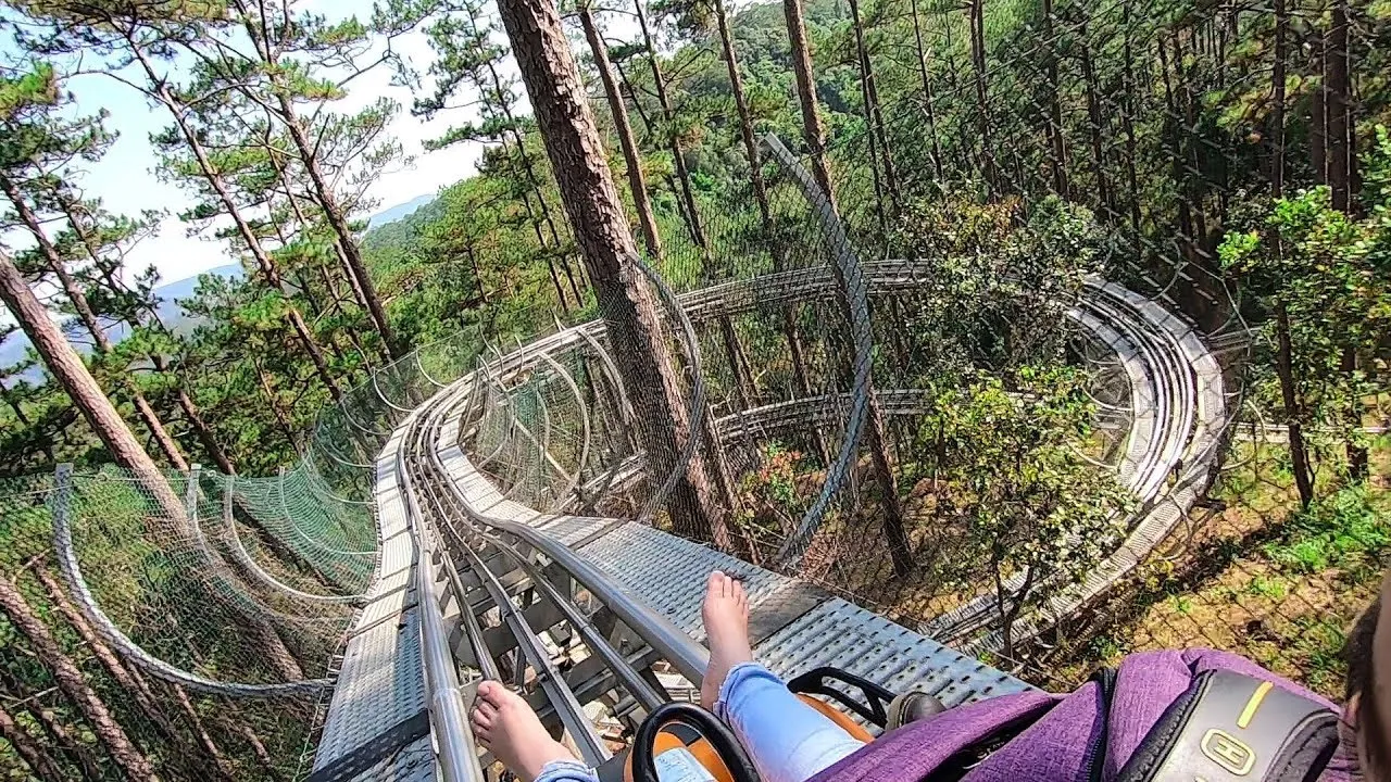 Exciting toboggan ride experience at Datanla Waterfall