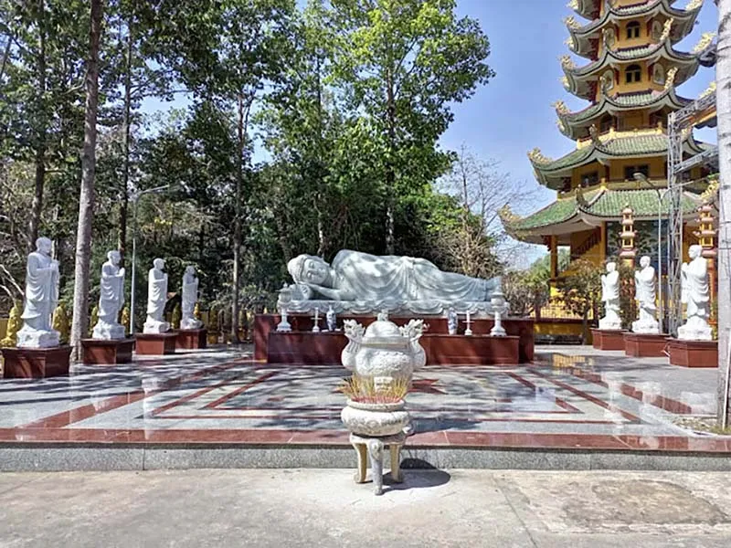 Reclining Buddha statue and famous stupa at the pagoda