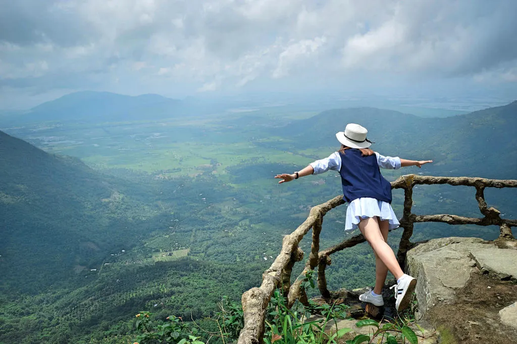 Vo Bo Hong peak in Nui Cam, the highest peak of That Son, where visitors can admire the panoramic view of An Giang during their Nui Cam An Giang tourism journey