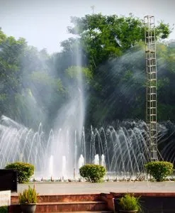 Watching water music show at Nui Coc Lake